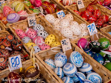 Colorfully decorated Easter eggs are displayed in wicker baskets at an Easter market in the Czech Republic.