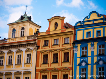 Colorful buildings lining the Old Town Square in Prague, Czechia.