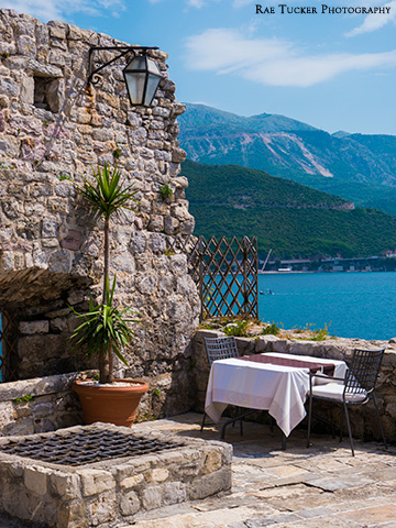 A table overlooks the sea in Budva, Montenegro