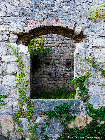 An arched window on the Kotor fortress in Montenegro