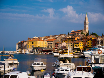 The old town and harbour of Rovinj sparkle under the morning sun.