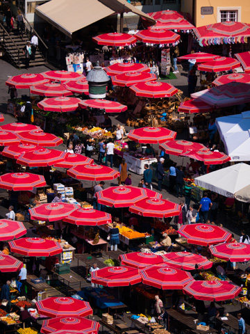 Red umbrellas cover the Dolac market in Zagreb, the city's most well-known open-air market