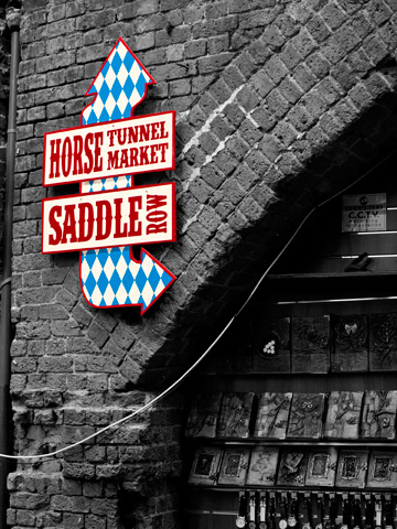 Horse Tunnel Market & Saddle Row sign in Camden Town Market