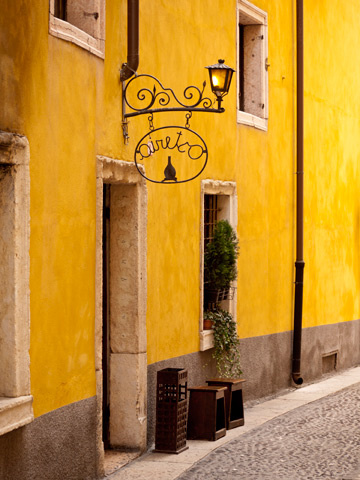 Architectural details in yellow in Verona, Italy