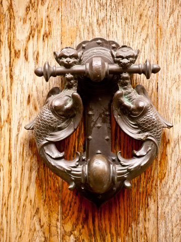 An ornate door knocker in San Marino