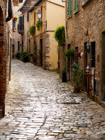 A stone street running through Montefioralle in Tuscany.
