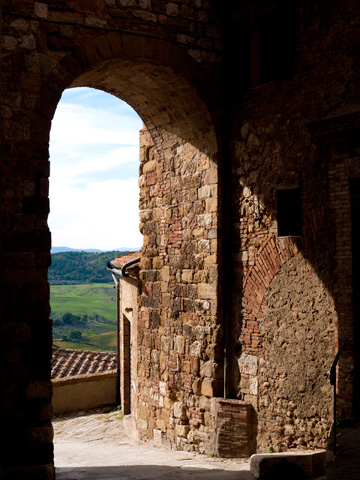 An entrance through the medieval walls of Montepulciano, Italy