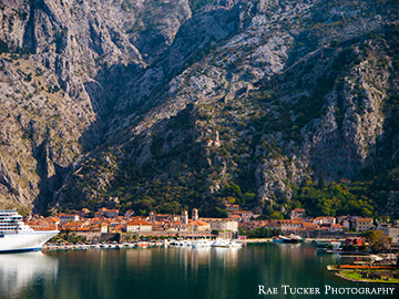 The stari grad, or old town, of Kotor, Montenegro sits between the mountains the the waters of Kotor Bay.