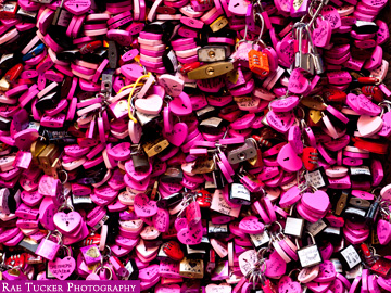 Pink heart locks in Juliette's courtyard in Verona, Italy