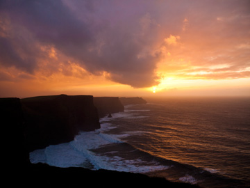 A dramatic winter sky over the Cliffs of Moher in Ireland.