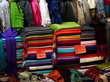 Scarves displayed at a market stall in Florence, Italy