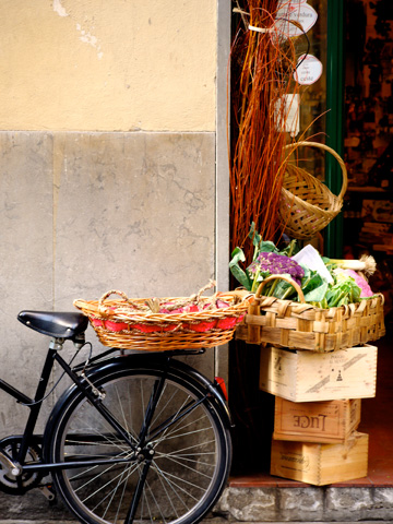 A bicycle outsite of a gourmet food market in Florence Italy