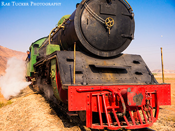 A steam engine train in the desert of Jordan