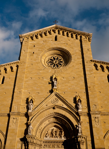 In Arezzo, Italy, the duomo glows in the late afternoon light.