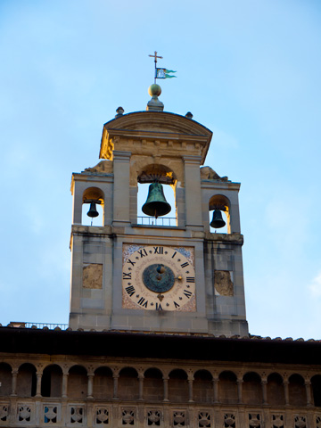 A clock and bell tower on the Lay Fraternity in Arezzo, Italy